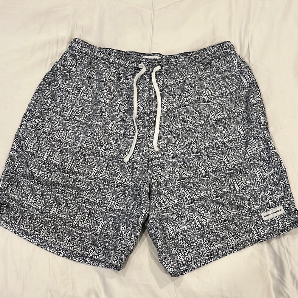 Modern Amusement Swim Trunks with Mesh Liner.
